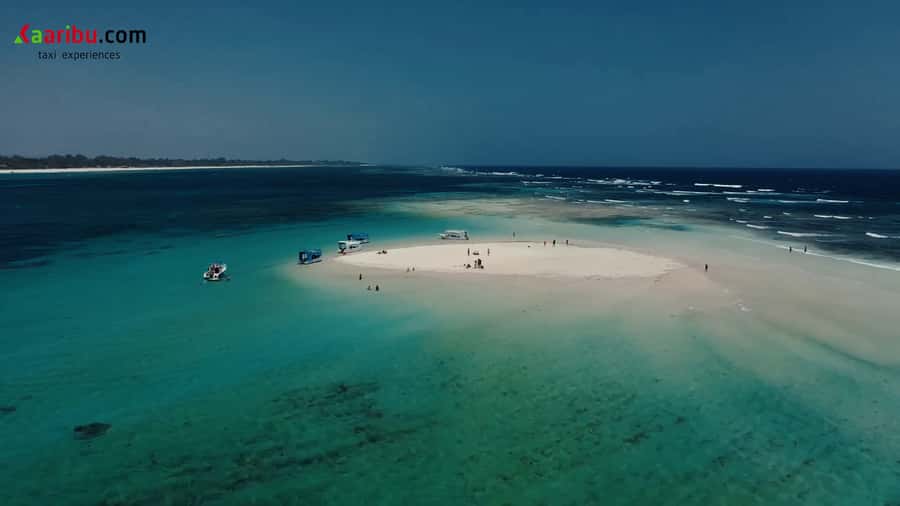 Diani Beach: Glass-Bottom Boat Cruise to Robinson Island - Snorkeling with the captain’s help
