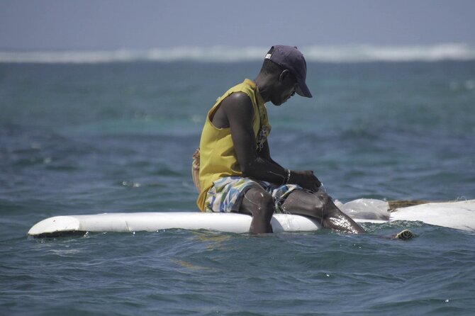 Diani Beach: Glass-bottom Boat Ride with Underwater Show - Reaching the sandbank for 45 minutes