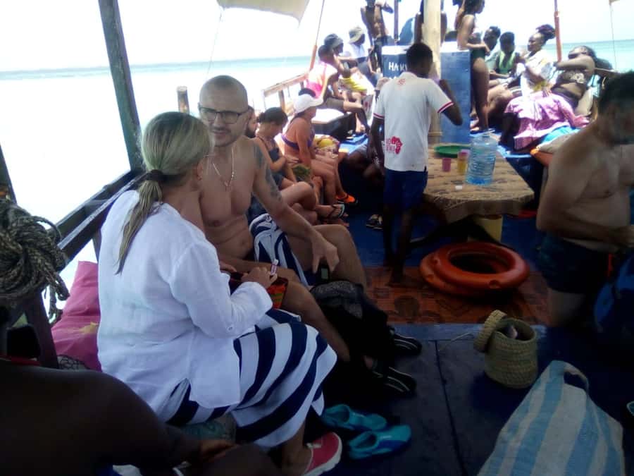 Diani: Wasini Island Dolphin Watching and Snorkeling Tour - Boarding the dhow at Shimoni