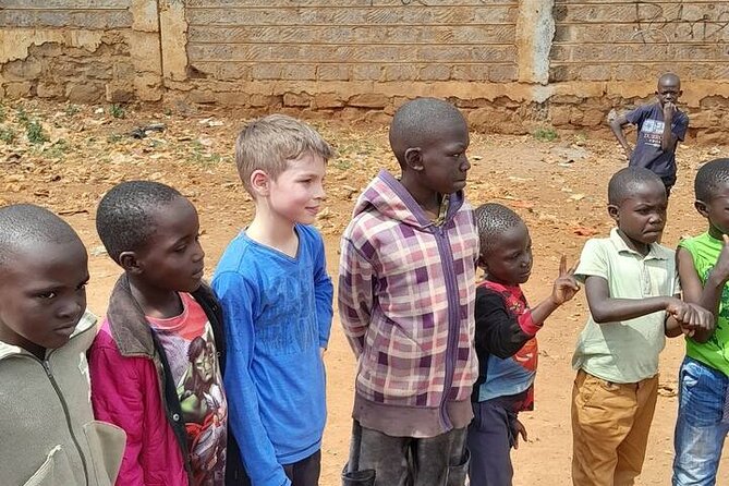 Kibera Slum Tour with a Local - Entering a local home