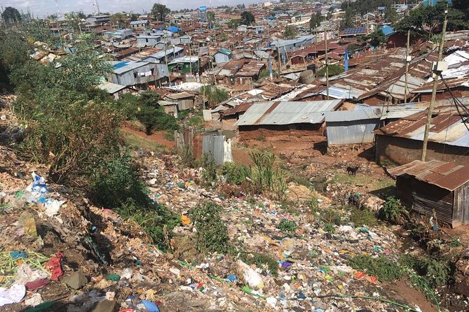 Memorable Daily KIBERA Slums/Toi Market Tour with Locals (2 hours) - NGO projects, education, housing, and health