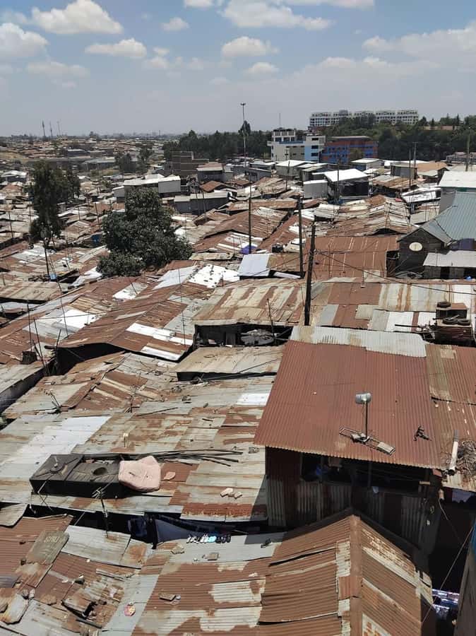 Nairobi: Kibera Slum Half-Day Guided Tour With Pick-up - Walking through Kibera and seeing daily work