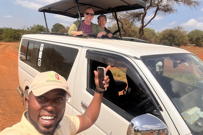 Safari In Nairobi Kenya National Park Half day Tour - The open-roofed van and photo opportunities